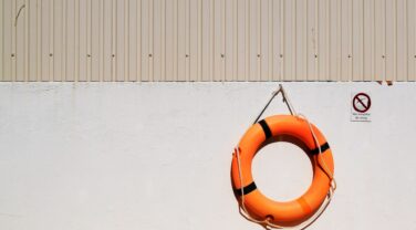 A strategic consulting company with a life preserver on a wall.